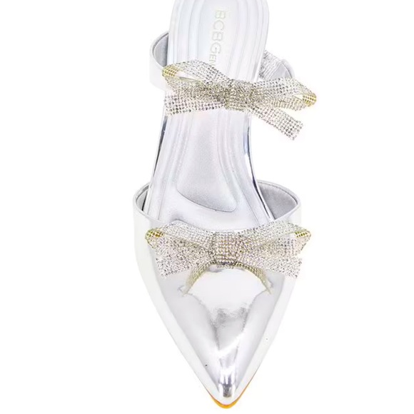 New BCBGeneration
Bardia Metallic Patent Rhinestone Bows Dress Mules - Picture 6 of 13